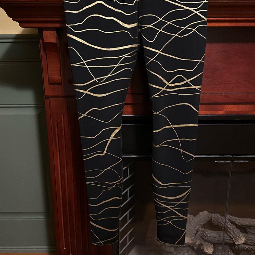 Nike gold and black leggings